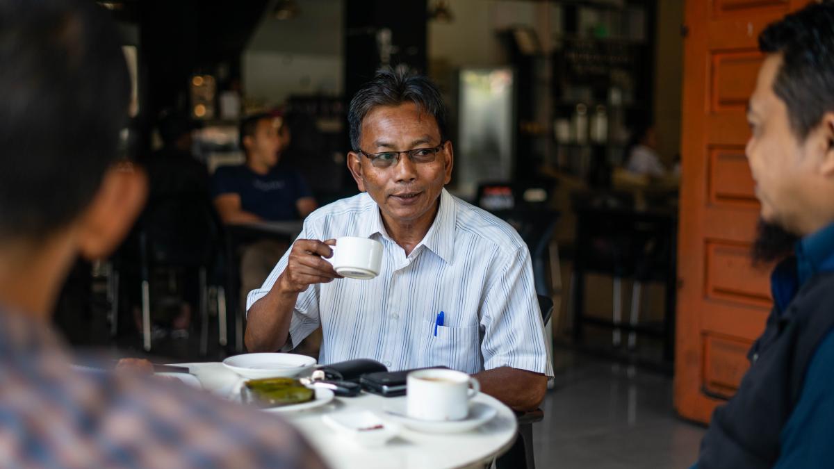 Rizwan Husin enjoys a cup of Gayo coffee.