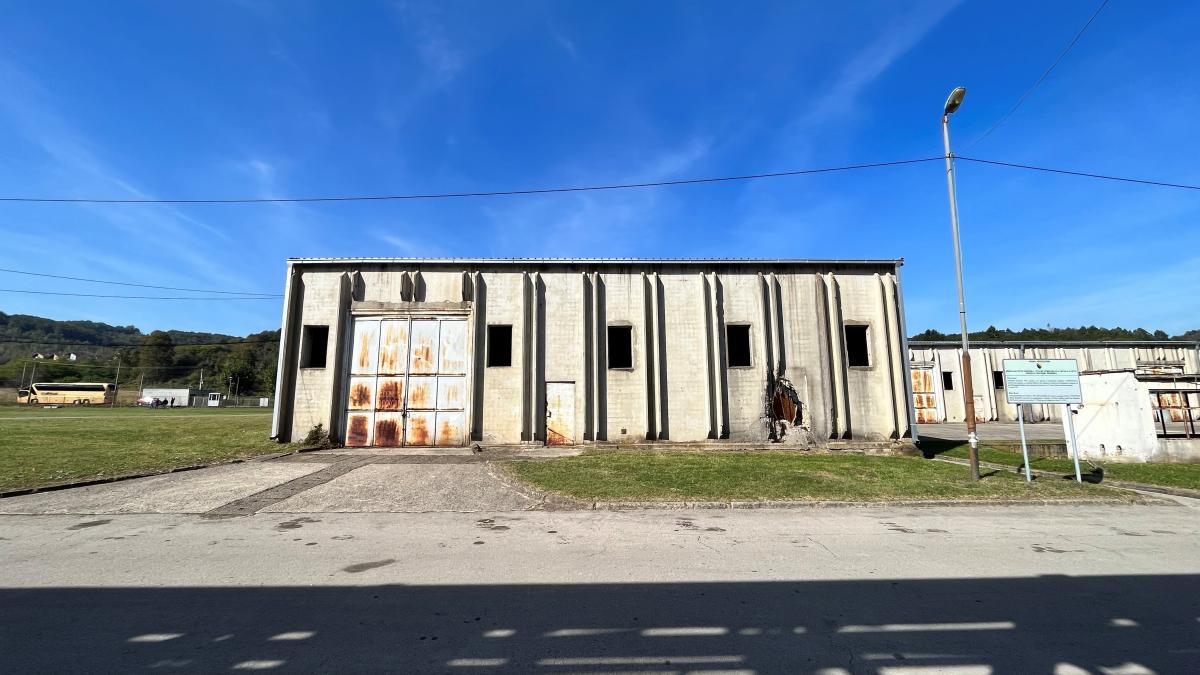 Exterior shot of the former car battery factory that houses the depot. 