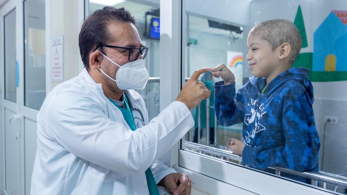 Dr. Vasquez with patient Jarvin Esequiel Bonilla. Foundation in El Salvador offers free medical treatment to children with cancer with Food For The Poor and LEPP support.