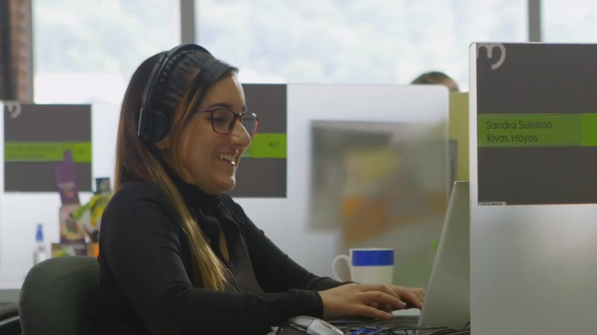 Sonia Girlado sits at her computer at EPM