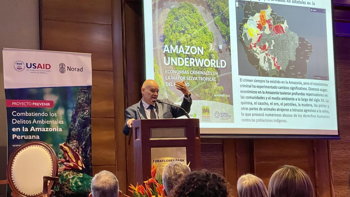 A man giving a presentation about Amazon conservation