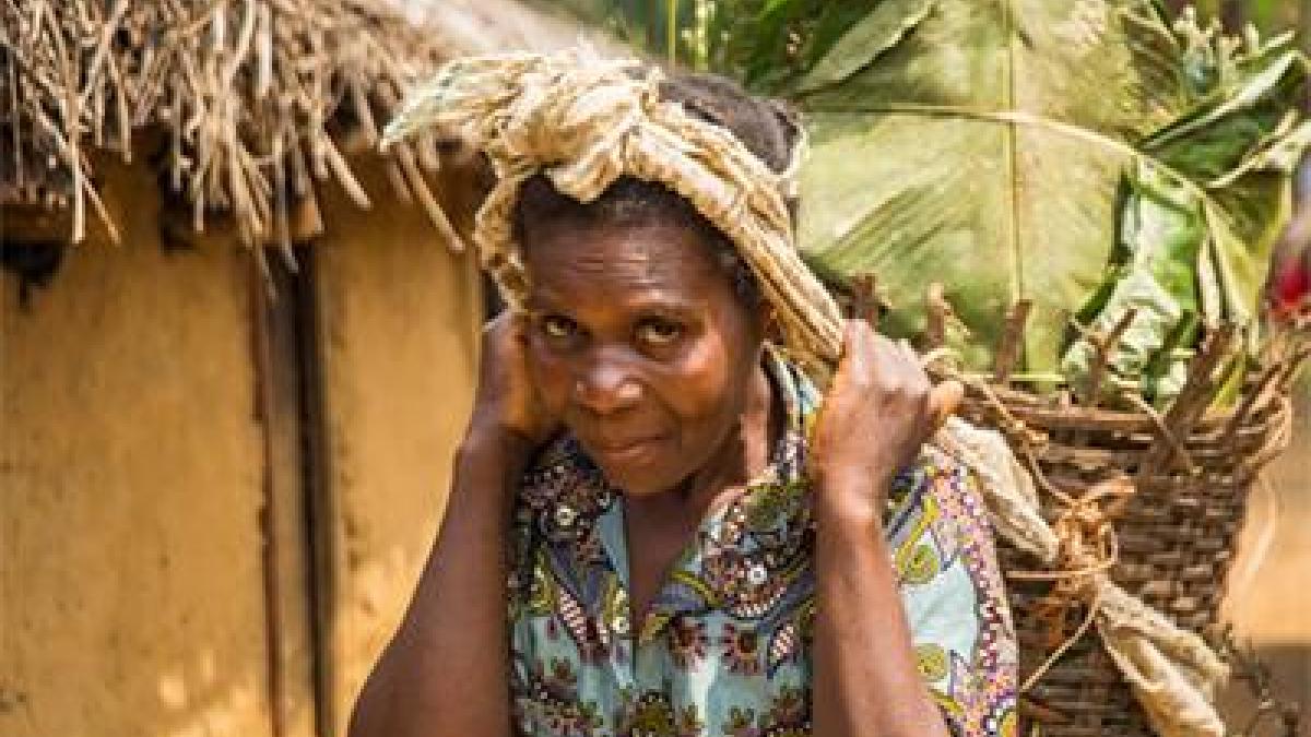 A person carrying goods on their head