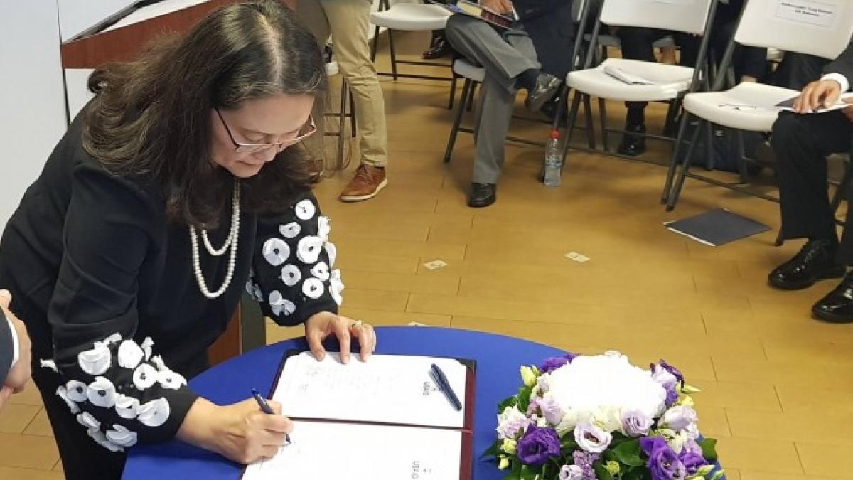 USAID Kosovo Swearing in Ceremony: Lisa Magno, USAIDKosovo Mission Director Signs the Oath of Office