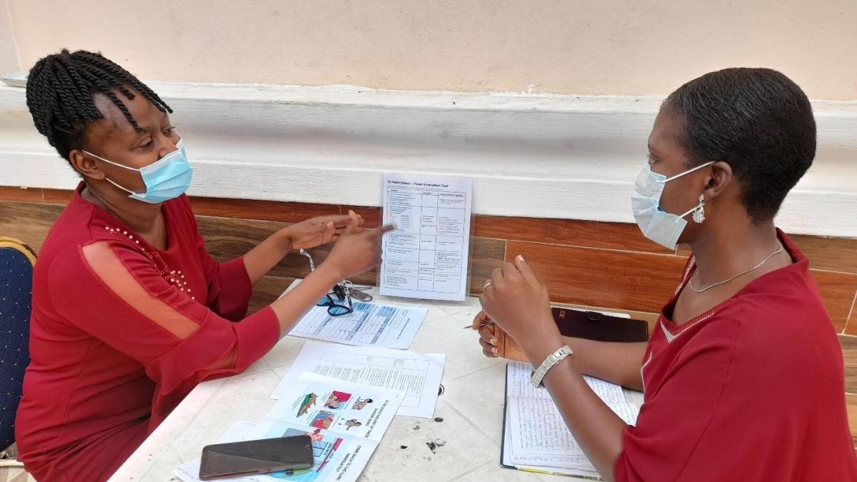 Health care worker training a colleague in primary health care in Agbowo, Oyo State, Nigeria