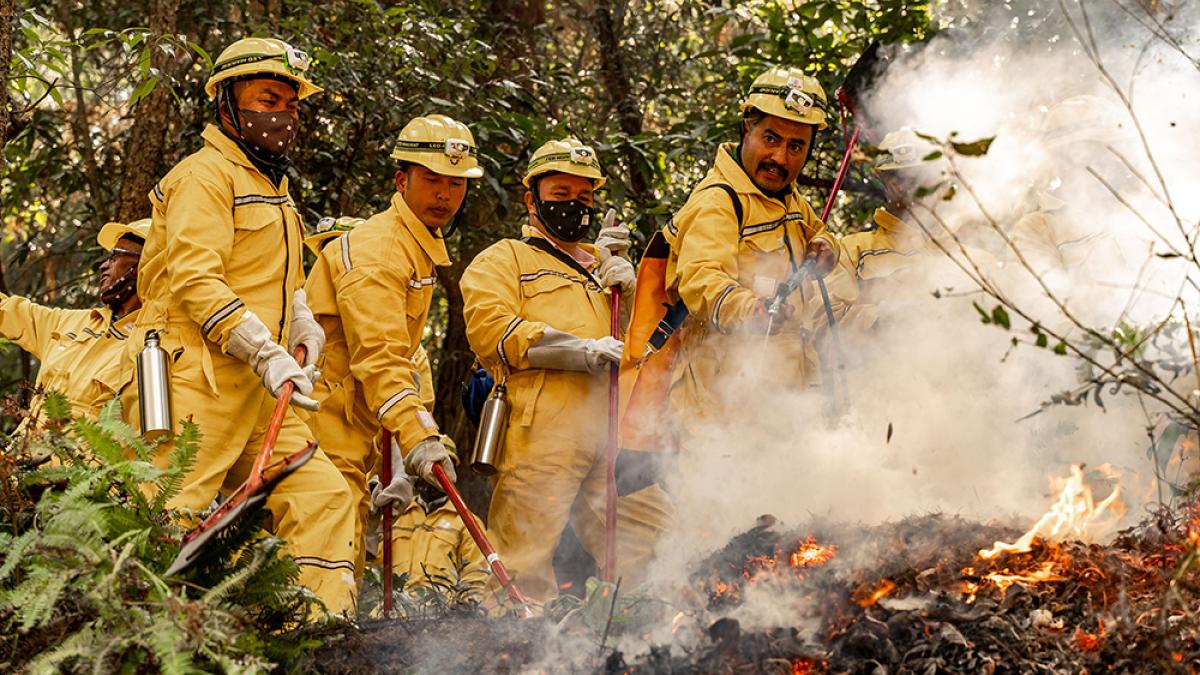 Local community members participate in a forest fire control training session in Mahalaxmi Municipality in Nepal’s Lalitpur district in March 2024. Photo Credit: FHI 360, Dipendra Bhandari.