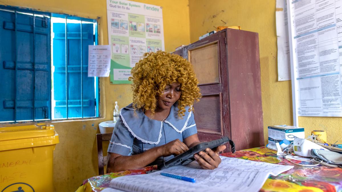 Nurse with digital device