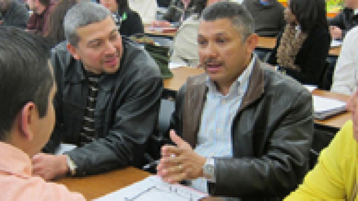 People conversing across a table