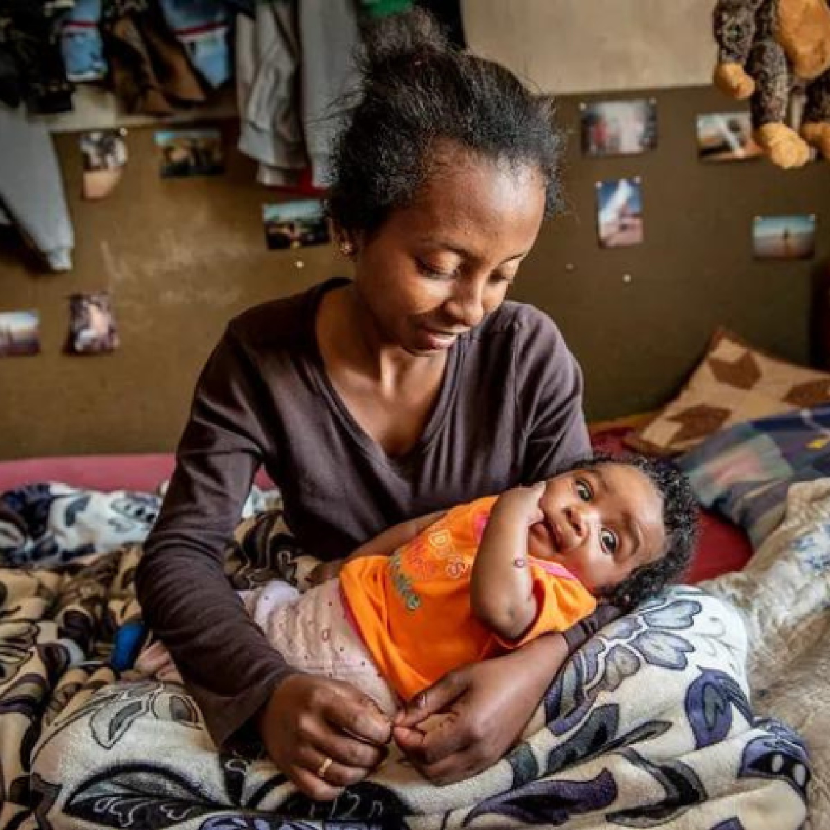 Mother holding child