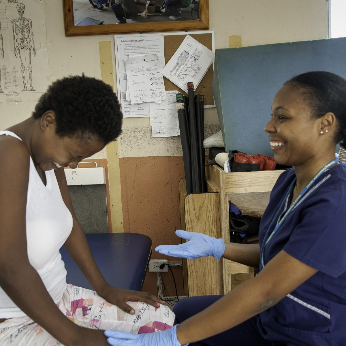 Dr. Sophia Laine and a patient smiling during therapy