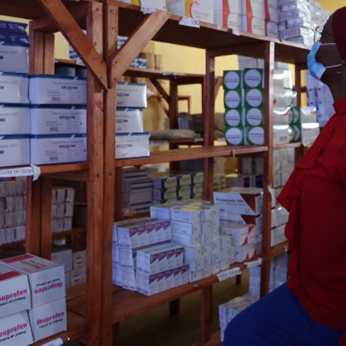 Noura Itunge working at the pharmacy