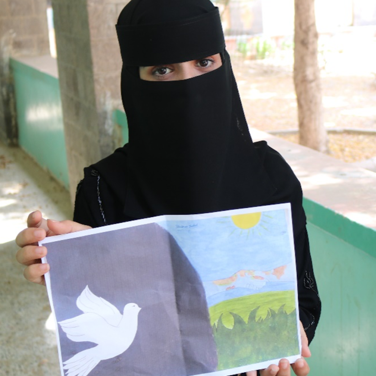 Youth create art in Yemen to process their experiences with conflict and promote human rights.