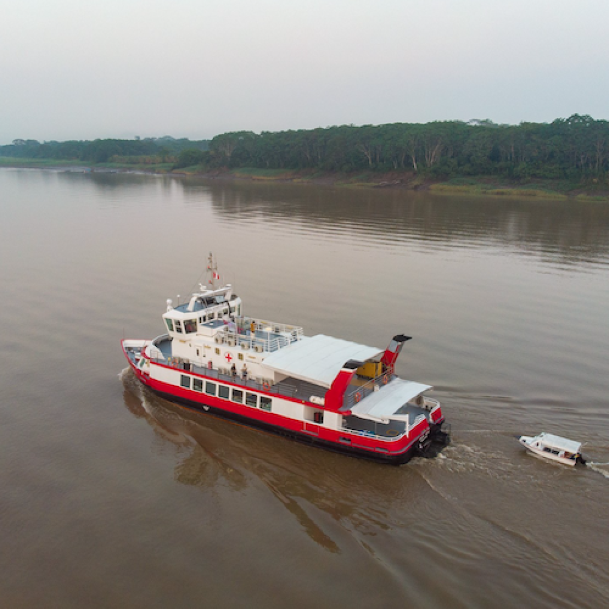 Hospital ship sailing an amazonian river