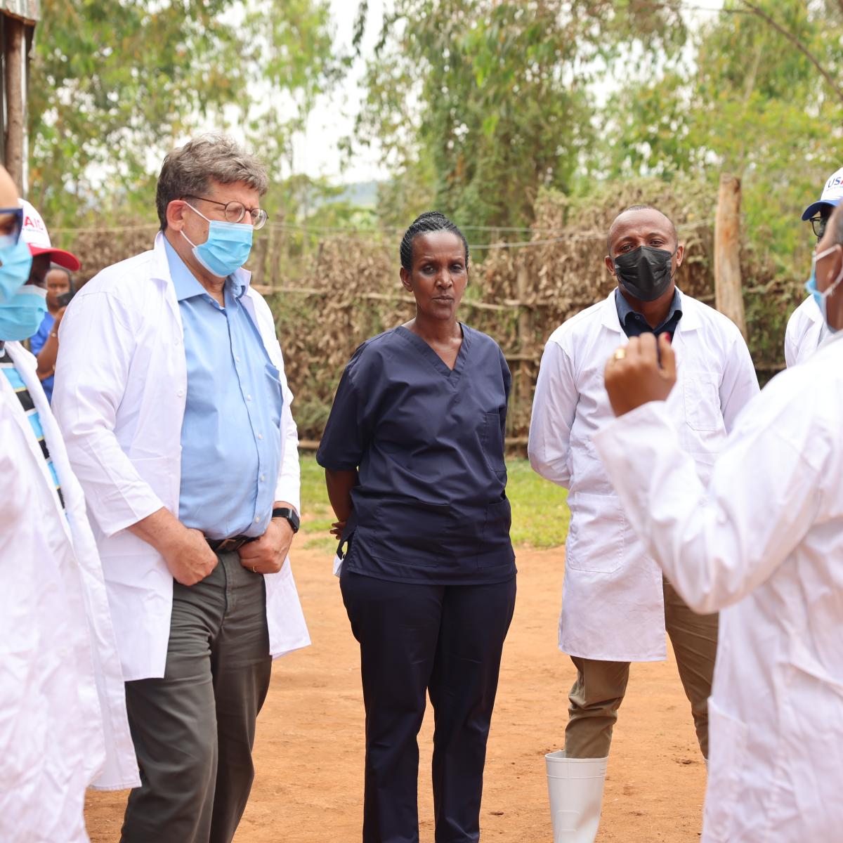 Lydia shares with USAID Rwanda Mission Director Jonathan Kamen how the Ready-to-Lay Pullet model has transformed her life.