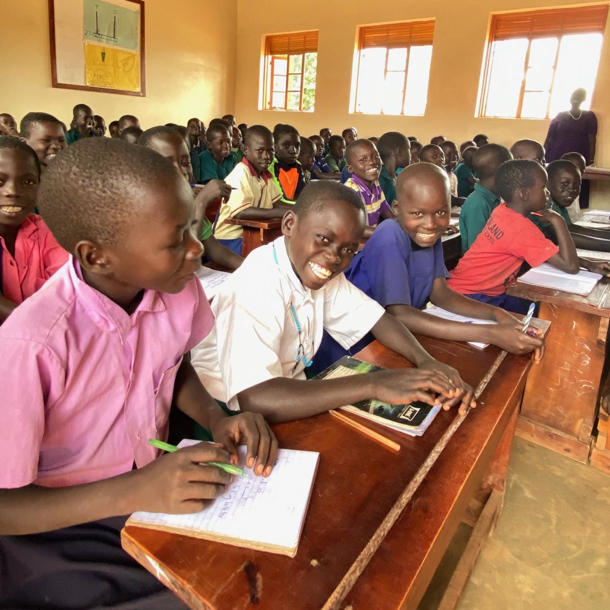 Ugandan school children. Photo by Karla Christensen and Malaika Media for USAID