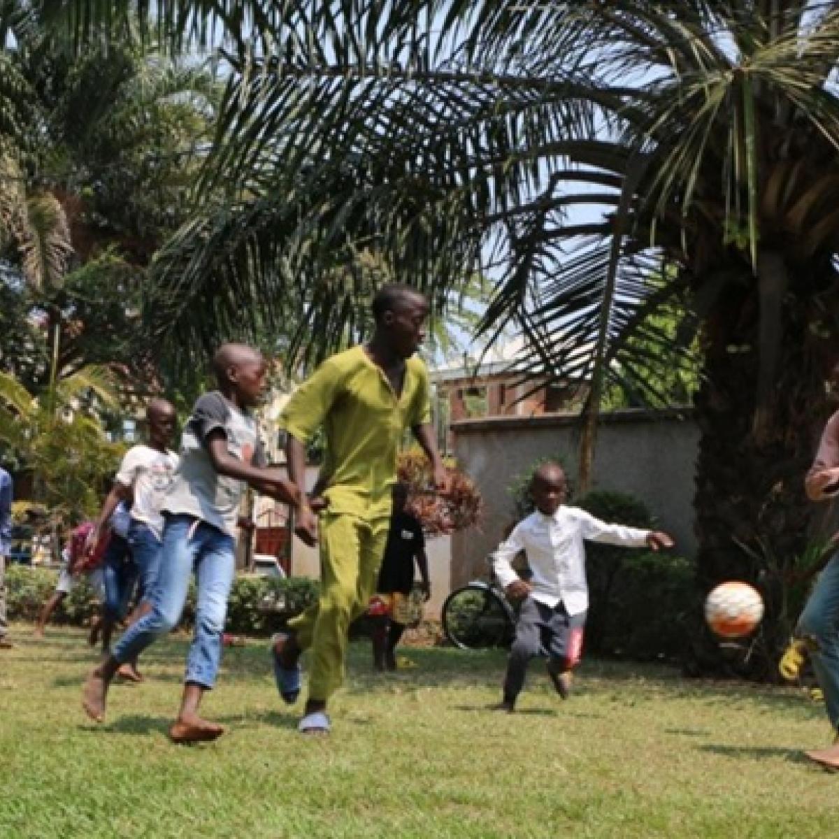 Survivors of trafficking in persons playing soccer at the accommodation center 