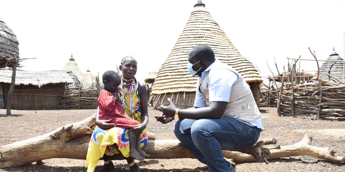 Job Logboro, a public health practitioner in Greater Kapoeta, Eastern Equatoria State, conducts a home sensitization visit in South Sudan’s Kapoeta South County. / Jemima Tumalu, CORE Group Partners Project