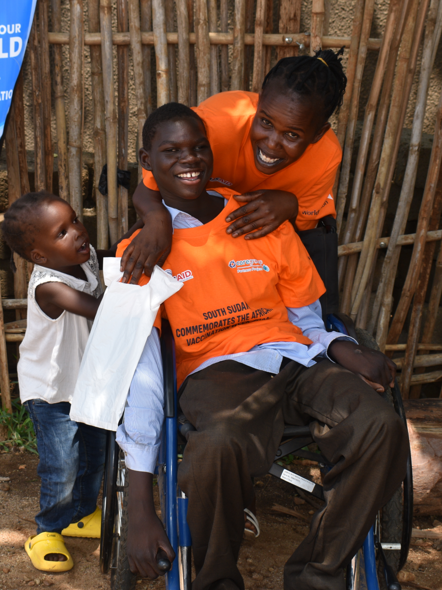 Flora Alfonse (right), a 34-year-old mother of three, poses with her daughters Nivin (middle) 14, a polio survivor, and Sarah (left) 3 at their home in Hai-Baraka, Juba County, Central Equatoria State. 