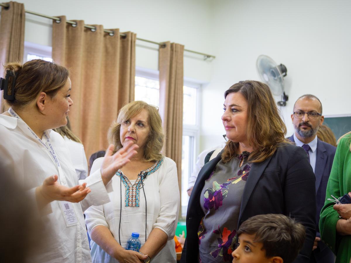 Mission Director Amy Tohill-Stull speaks with facilitators at the STEAM Summer Adventure Camp.