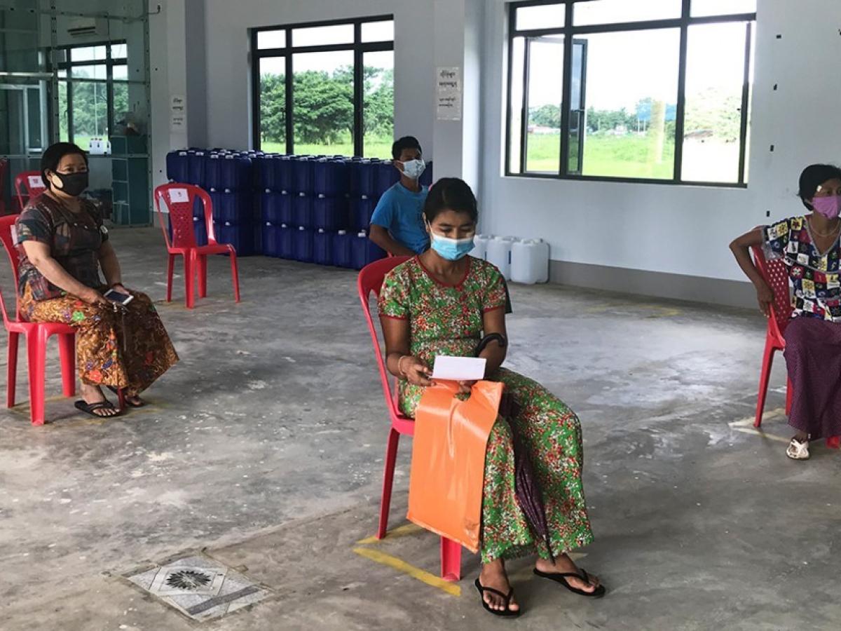 Health workers and clients from the clinics follow the social distancing guidelines, wear PPE, and provide handwashing facilities to prevent the spread of COVID-19.