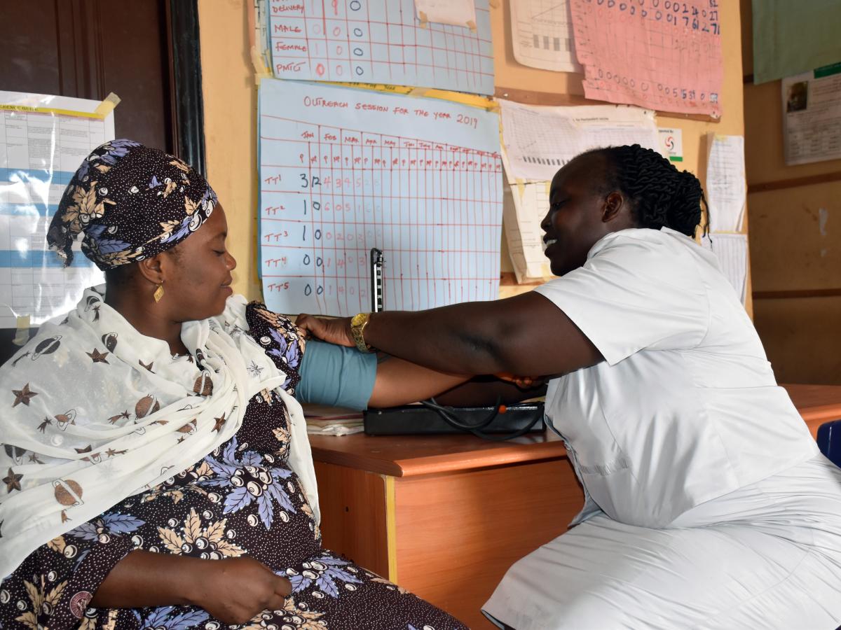 Morale among staff has greatly improved with the restoration of electricity. Christianah Okunola, PHC Alekuwodo’s deputy officer-in-charge, is seen here attending to a patient.