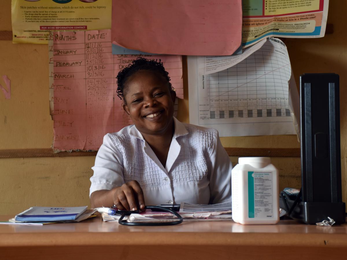 PHC Alekuwodo Officer-in-Charge Titilayo Aremu sits at her newly lit desk.