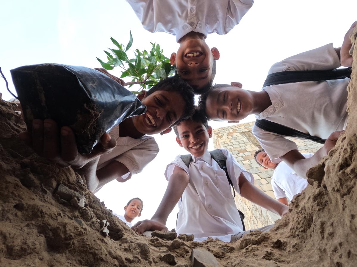 Children planting trees