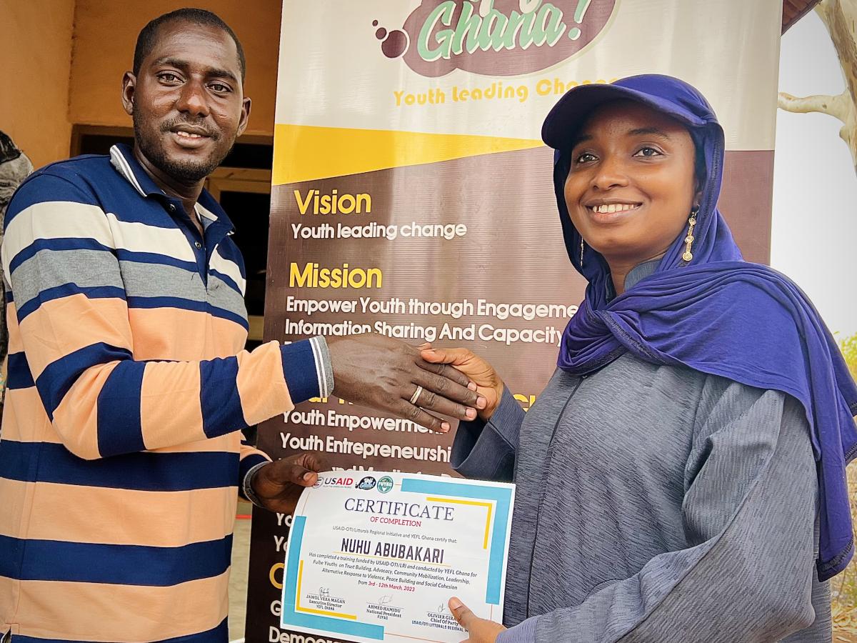 participant receives his certificate after bootcamp training