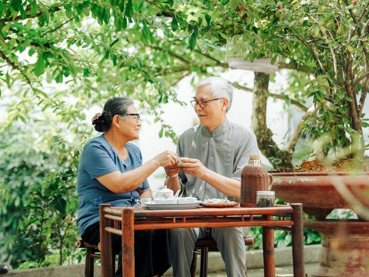 Mr. Son and Ms. Dung founders of tea farm