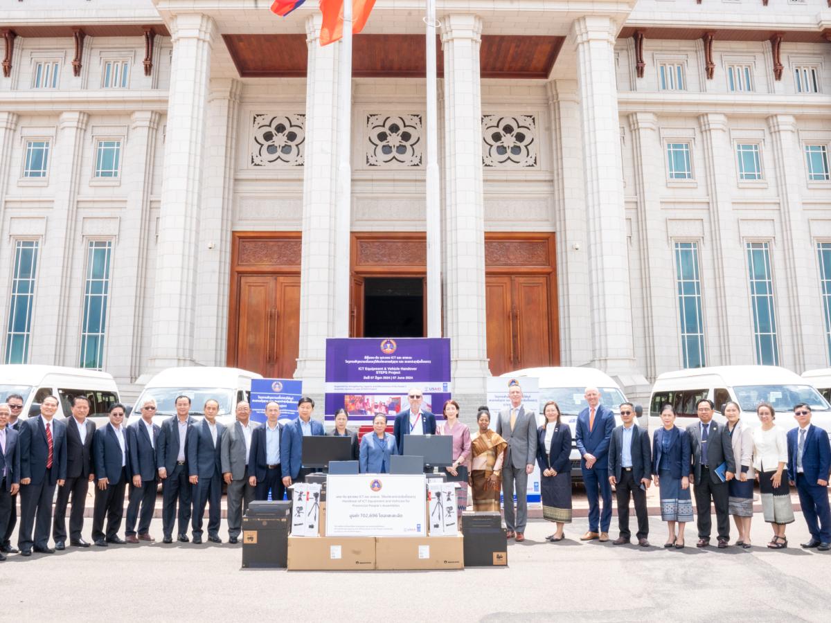 US and Laos Official at the Handover Ceremony of USAID-funded Vehicles and IT Equipment