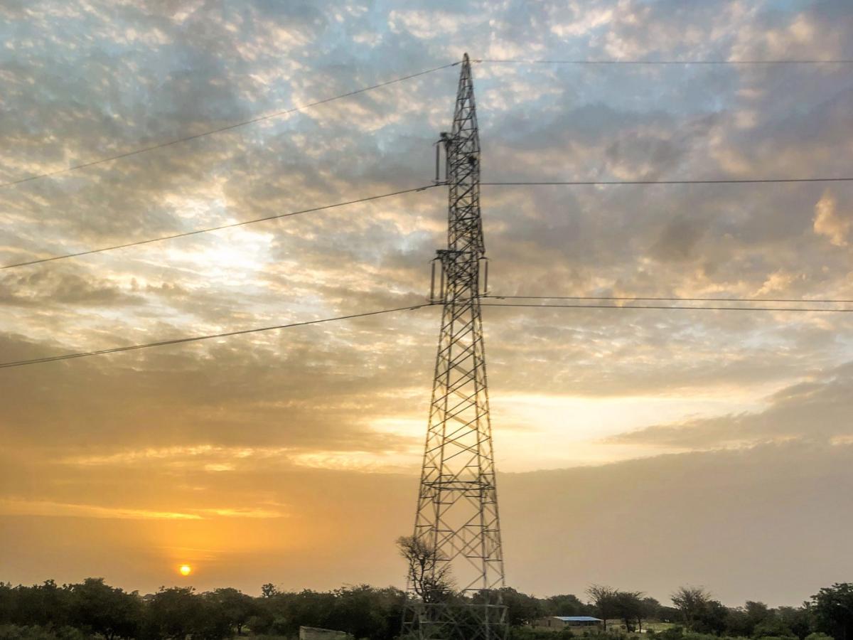 A transmission line at sunset