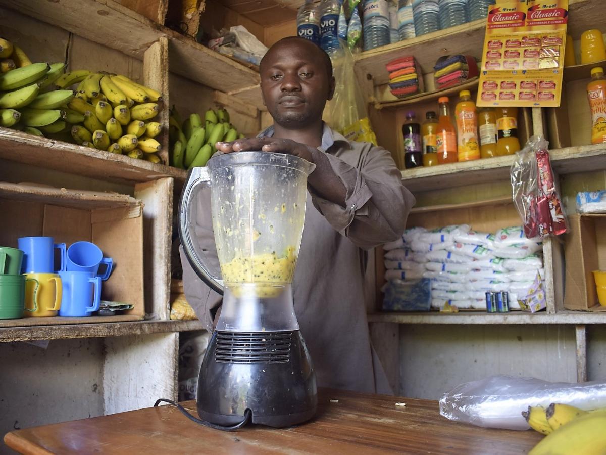 A man using a juicer