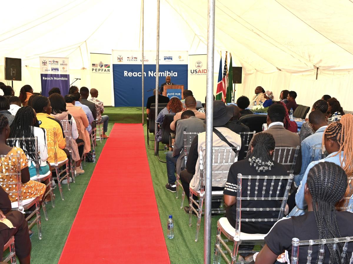 USAID Acting Country Representative Rockfeler Herisse addresses the attendees of Reach Namibia’s ALIVE Hub Launch event at Rundu, Kavango-East.