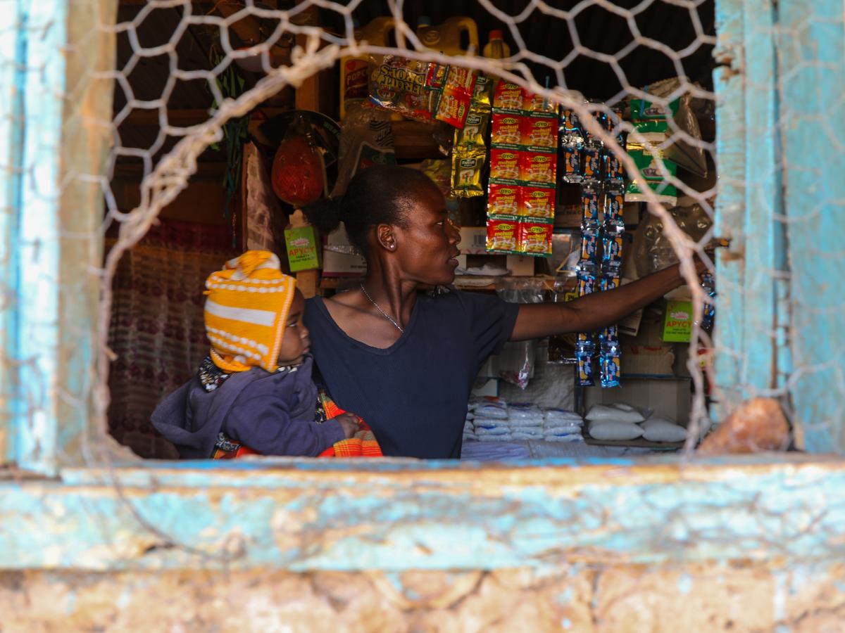 Mary Imoit is managing her small retail shop located in Manyatta Zebra village, Isiolo County. photo credit: Anthony Nyandiek/USAID Nawiri 