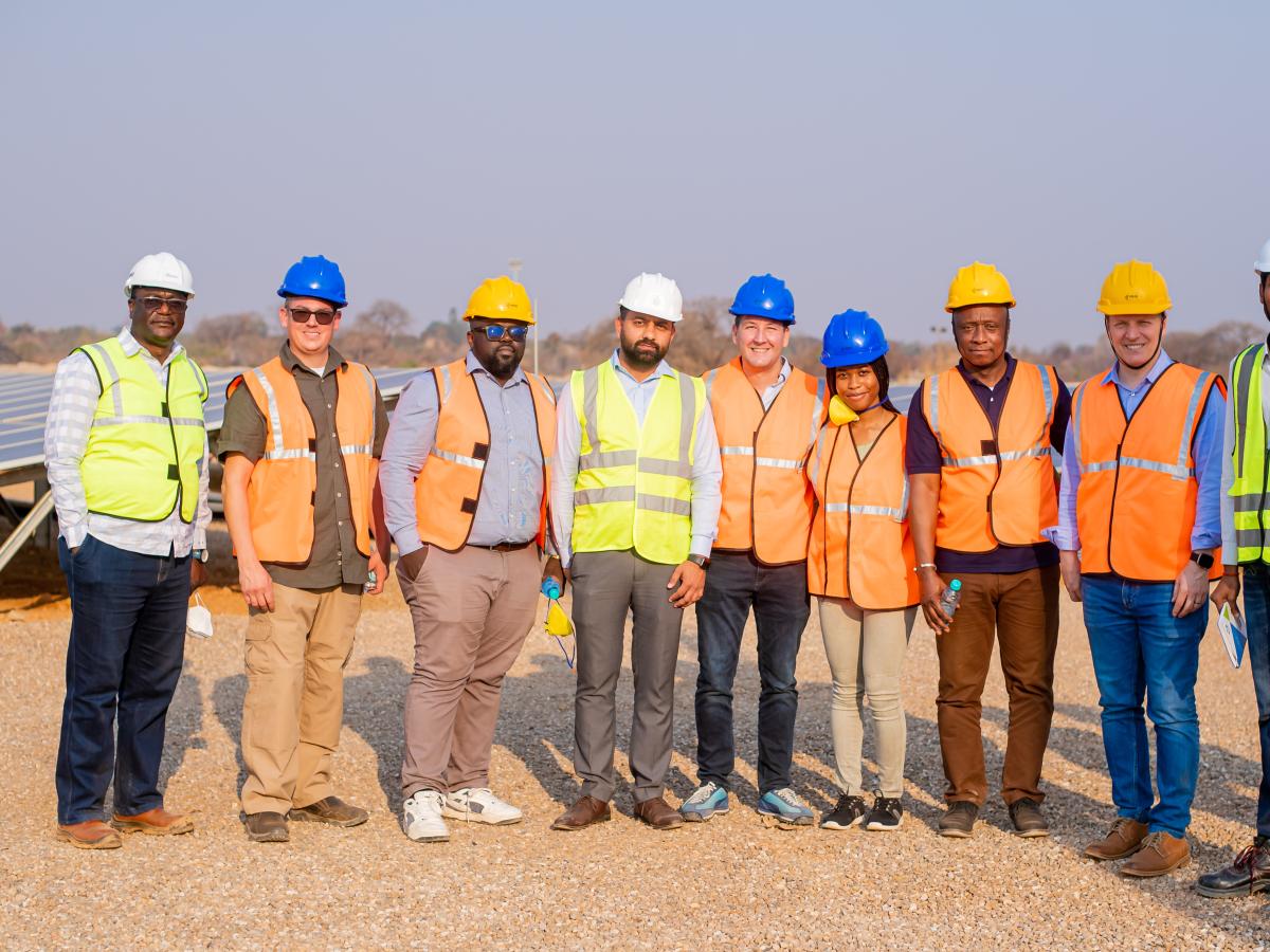 Richard Nelson (second from right) along with staff from Power Africa, USAID, the U.S. Embassy in the Democratic Republic of the Congo, Vinmart Group, and SOMIKA visit a 5 MW solar power plant at the Lupoto Mine in Lubumbashi.