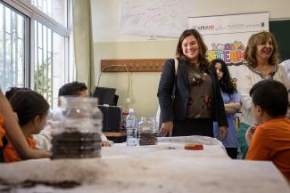 Mission Director Amy Tohill-Stull with students participating in the STEAM Summer Adventure Camp