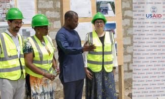 Deputy USAID-Ghana Mission Director Grace Lang and Ghana Health Service Director General Patrick Kuma-Aboagye