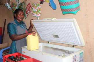 Women in her business in Uganda, learning to read efficiency labels and understanding consumption in chest freezers. USAID in collaboration with Lawrence Berkeley National Laboratory has designed the Energy Empowers East Africa Program, to increase the inclusion of women in electrification programs throughout East Africa. The objective is to identify key actions that will unlock the benefits of modern energy access for women and enhance their role as agents of change in promoting clean, affordable, and ef