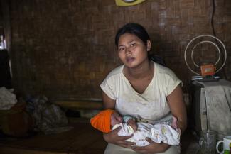 Ibu Asnah with her third son, Restu Pantura.