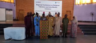 Participants of the Regional Conference on Religious Tolerance and Intra Muslim Cohesion pose during its closeout session.