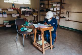 Storekeepers reviews the supplies for the day.