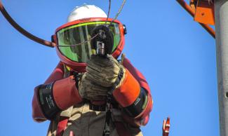 Person working on electrical lines