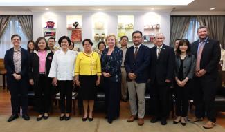 Group photo of delegates from USAID Regional Development Mission for Asia, JICA, TICA, and Australian Embassy.