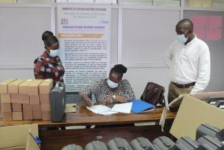 TMA’s Manager for Environment & Research Ms. Sarah Osima signs off on the official handover agrometeorological supplies with FAO’s National Project Coordinator Mr. Diomedes Kalisa (right) and In Country Coordinator Ms. Rebecca Mwasyoke of Washington State University International Development Office (left). Since 2015, USAID has funded the “Building Capacity for Resilient Food Security Project,” which provides technical assistance and funding to TMA.