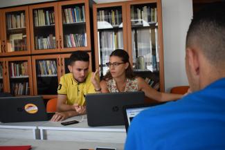 Merxhan Daci, left, and Anxela Ruci at the Faktoje office.