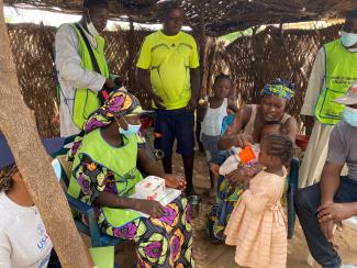 Child receiving free malaria medicine during seasonal chemoprevention campaign in the Northern part of Cameroon.