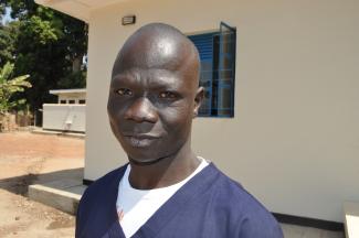 Richard Yona, 32, the first male midwife in Yambio, South Sudan, has helped mothers safely deliver countless babies over the past six years at the USAID-supported Bazungua Primary Health Care Clinic