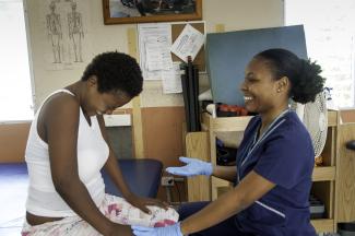 Dr. Sophia Laine and a patient smiling during therapy