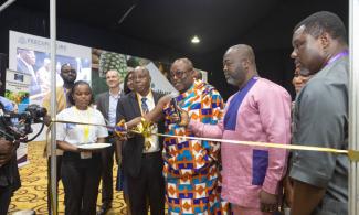 Representative of the Ga Mantse and President of the Ga Traditional Area leads partners in ribbon cutting to officially open the Ghana Horticulture Expo, 2024