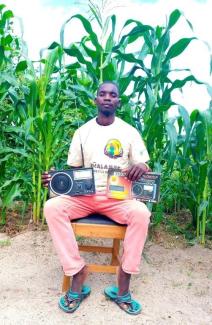 A man poses with his radio.