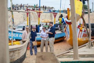 Mission Director Kimberly Rosen and the Ghana Fisheries Recovery Activity team touring the fish landing beach at Otuam in the Central Region of Ghana Photo credit: Yooku Ata-Bedu, USAID/Ghana.